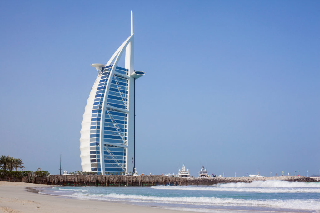 Burj al-Arab in the daytime against the background of the sea and blue sky